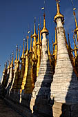 Inle Lake Myanmar. Indein, on the summit of a hill the  Shwe Inn Thein Paya a cluster of hundreds of ancient stupas. Many of them are ruined and overgrown with bushes.